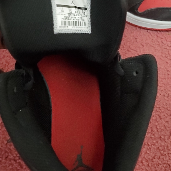 Red Jordan 1 Mid's